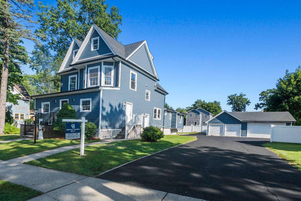 Lincoln Place Residences, Side elevation · four-car garage